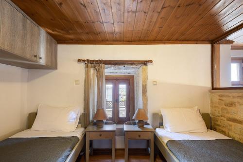 Ένα ή περισσότερα κρεβάτια σε δωμάτιο στο Villa Salis