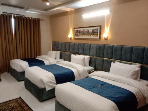 Grand Blu Hotelにあるベッド