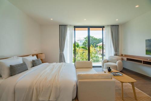 Postel nebo postele na pokoji v ubytování Modern Tropical Pool Villa - Saiyuan