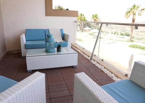 A seating area at Gorgeous 2BR Gozo Apt with private balcony & Pool by 360 Estates