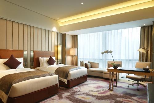 InterContinental Changshaにあるベッド