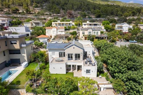 an aerial view of a house at Rosh HaNikra Garden Villa Retreat by Sea N' Rent in Sulam Tsor
