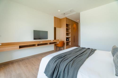 TV a/nebo společenská místnost v ubytování Modern Tropical Pool Villa - Saiyuan