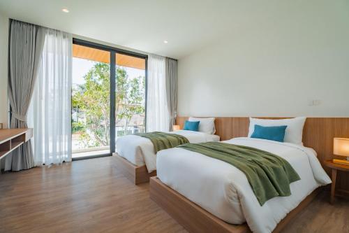 Postel nebo postele na pokoji v ubytování Modern Tropical Pool Villa - Saiyuan