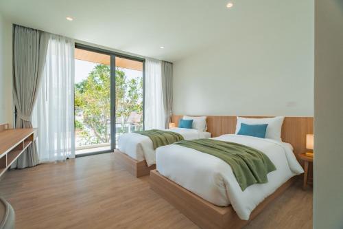Postel nebo postele na pokoji v ubytování Modern Tropical Pool Villa - Saiyuan