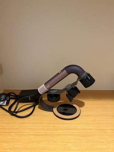 a microphone on a stand on a wooden floor at Xiangkong in Sanxing