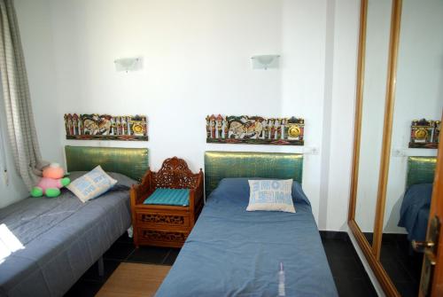 Ένα ή περισσότερα κρεβάτια σε δωμάτιο στο Villa Teresa
