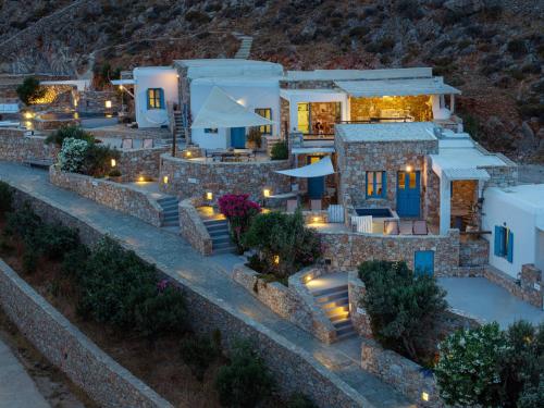 an aerial view of a house with lights at Zefiros in Karavostasi