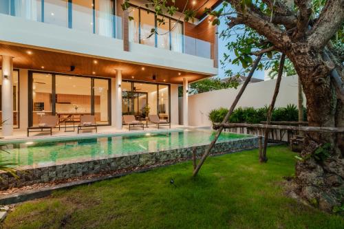 Bazén v ubytování Modern Tropical Pool Villa - Saiyuan nebo v jeho okolí