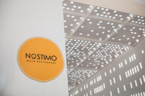 a label for a noshinoarma restaurant on a table at Aiora Resort in Pefki Rhodes