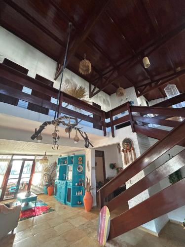 a living room with two loft beds in a house at POUSADA Coisa Mais Linda e Massagem in Cascavel
