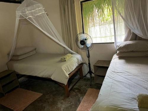 Mango Beach Resortにあるベッド