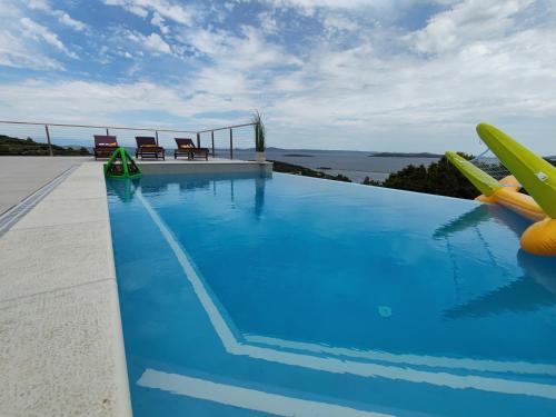 Πισίνα στο ή κοντά στο MY DALMATIA - Sea view Villa Belvedir with private heated infinity pool