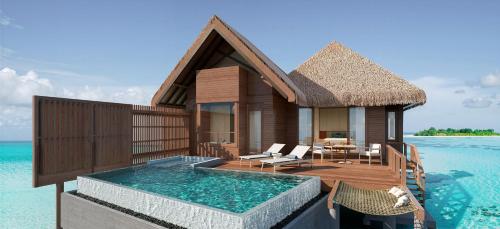 a villa on the water in the maldives at Kandolhu Maldives in Himandhoo 
