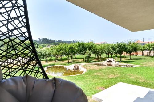 Taman di luar Casas D' Além by Sé Apartamentos
