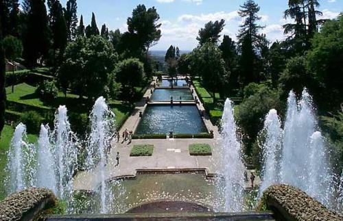 a fountain in the middle of a park at Il Melangolo in Tivoli