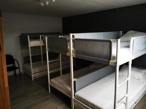 Ένα ή περισσότερα κρεβάτια σε δωμάτιο στο Cor-U