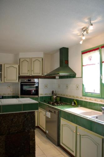 Cuina o zona de cuina de APPARTEMENT MOUFLONS