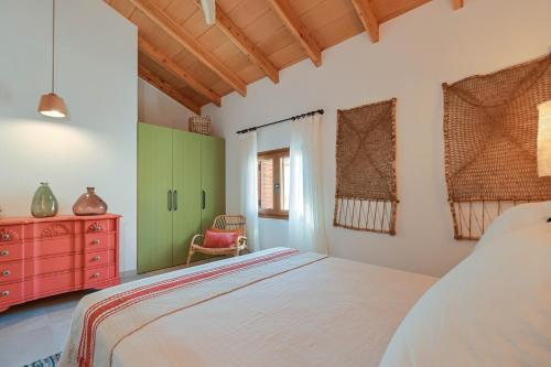 Ένα ή περισσότερα κρεβάτια σε δωμάτιο στο Casa Paraiso by Marhen Homes