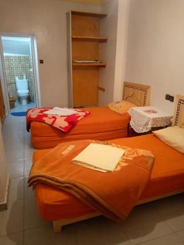 Ein Bett oder Betten in einem Zimmer der Unterkunft Ecogite La Tourterelle - B&B