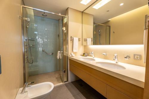 Koupelna v ubytování Saifi Suites Hotel