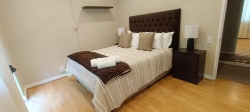 Ein Bett oder Betten in einem Zimmer der Unterkunft WinOne on 4 Chantecler