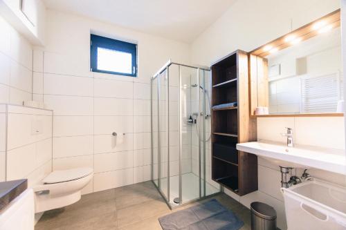 Koupelna v ubytování GH Luxury Apartments Graz, Kalvarienberg