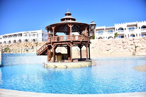 a gazebo in the middle of a swimming pool at Hollywood Aqua Park Sharm El-Sheikh in Sharm El Sheikh