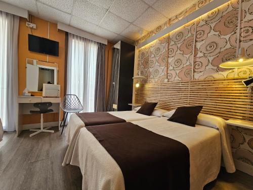 Cama o camas de una habitación en Hotel Palermo