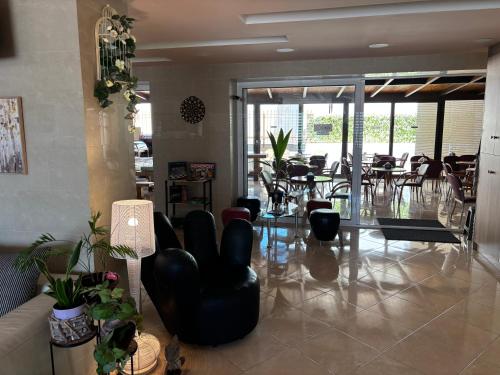 Posezení v ubytování Nikolakakis Rooms Lavrio
