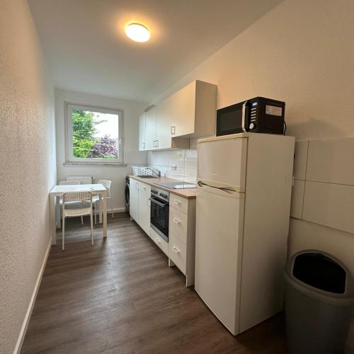 Η κουζίνα ή μικρή κουζίνα στο WDI - Workers Apartments 2