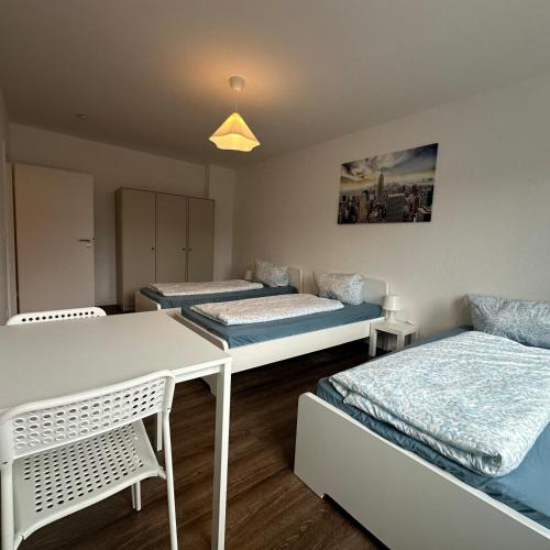 Ένα ή περισσότερα κρεβάτια σε δωμάτιο στο WDI - Workers Apartments 2