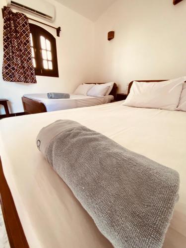 Postel nebo postele na pokoji v ubytování Zad & Safar Long Accommodation