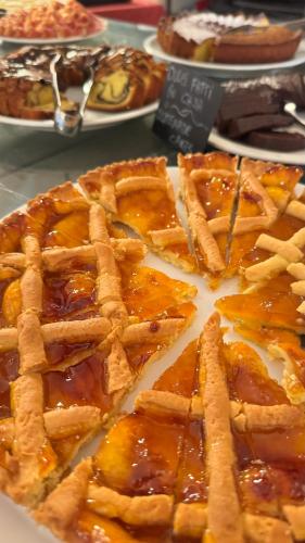 a plate of waffles with syrup on a table at Agriturismo San Ottaviano in Monterotondo