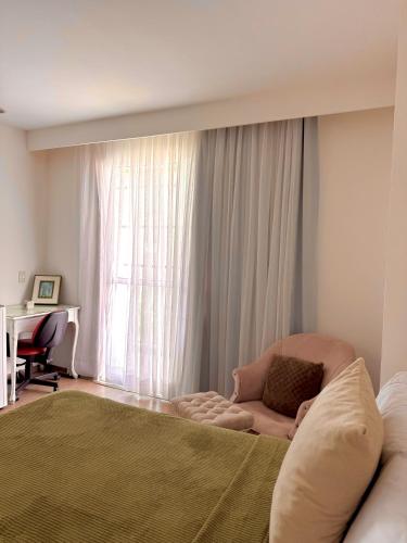 Ένα ή περισσότερα κρεβάτια σε δωμάτιο στο Loft vistamar business completo