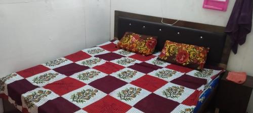 Katil atau katil-katil dalam bilik di Blue star hoteL