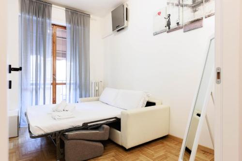 Postel nebo postele na pokoji v ubytování Florentine Touch - Orsini 76