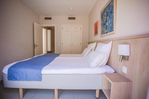 Ένα ή περισσότερα κρεβάτια σε δωμάτιο στο Caybeach Meloneras