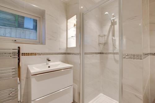 Koupelna v ubytování Langland Corner Lodge