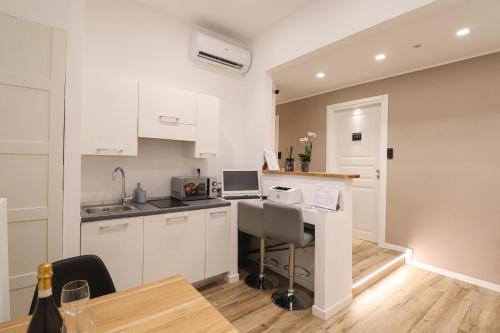 Una cocina o kitchenette en Essenza House
