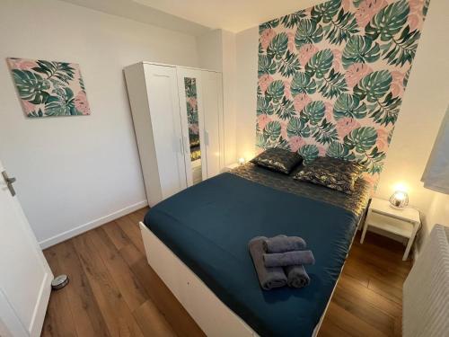 Postel nebo postele na pokoji v ubytování La Maison Mirabelle