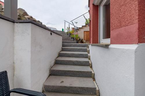 a set of stairs leading up to a building at Ferien in der Vulkan-Eifel in Mendig