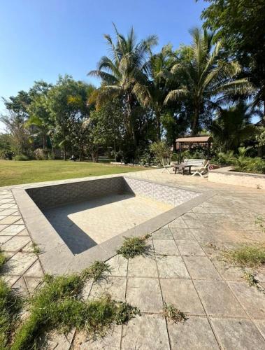 Κήπος έξω από το Farm House stay in Ahmedabad