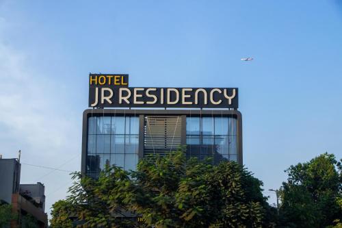 a sign on top of a building at J R Residency in Navi Mumbai