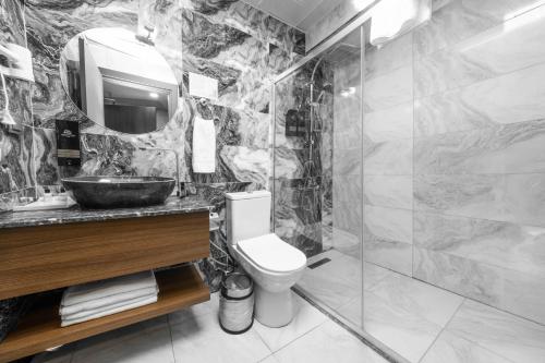 Ένα μπάνιο στο Velmore Hotel & Spa
