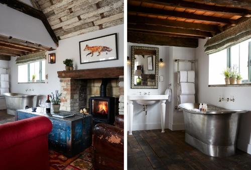 a living room with a fireplace and a bathroom with a tub at Artist Residence Oxfordshire in Oxford
