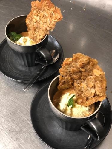 two bowls of food sitting on a table at Hotel Weyh in Pressath