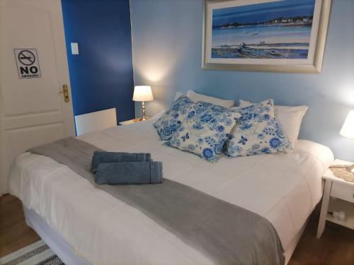 Ένα ή περισσότερα κρεβάτια σε δωμάτιο στο Aqua View Riverside Guesthouse
