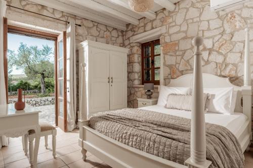 Кровать или кровати в номере Villa Boscheto Pente