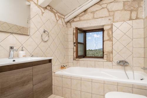 Ванная комната в Villa Boscheto Pente